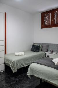 a room with two beds and a couch at Juanvi's Corner in Costa de Adeje +32 photos