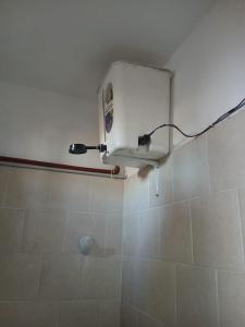 Ένα μπάνιο στο Salón Amplio Céntrico Habitación Privada 4 personas
