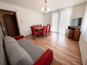 TV a/nebo společenská místnost v ubytování Veritas Apartment Zamárdi