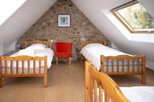 Voodi või voodid majutusasutuse ty Gouermel Location Bretagne toas