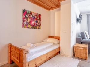 Una cama o camas en una habitación de Selbkönig