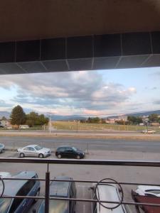 a view of a parking lot with cars on the road at Motel Bella Italia in Sarajevo +24 photos