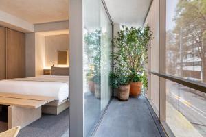 En eller flere senge i et værelse på Lamartine Boutique Hotel Polanco