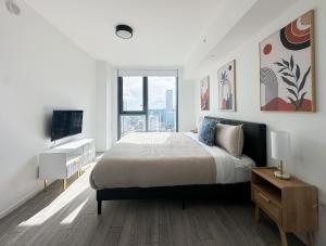 Cadenza Miami - Luxury Residences客房内的一张或多张床位