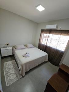 Flat Santa Teresaにあるベッド