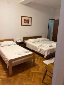 Posteľ alebo postele v izbe v ubytovaní Kampor Apartment 3