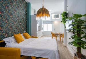 Ένα ή περισσότερα κρεβάτια σε δωμάτιο στο Centrico y Acogedor Playa a Solo 3 Minutos