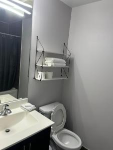 A bathroom at Stylish 2BR Suite by Square One