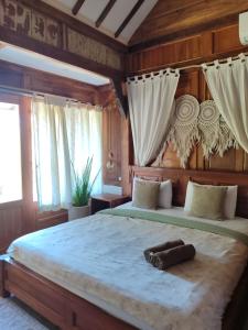 Little Elephant Cottage客房内的一张或多张床位