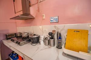 Kuchyň nebo kuchyňský kout v ubytování Ana-as Apartelle (GGL)