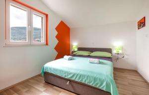 Posteľ alebo postele v izbe v ubytovaní Apartments D&A