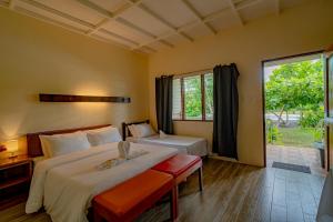 Postel nebo postele na pokoji v ubytování Ana-as Apartelle (GGL) + 37 fotografií