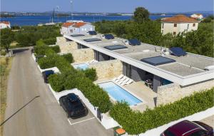 an aerial view of a house with a swimming pool at Villa K1 in Zadar