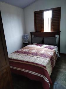 Postel nebo postele na pokoji v ubytování Recanto do Sabiá Residential + 15 fotografií