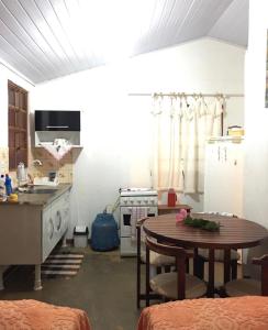 Kuchyň nebo kuchyňský kout v ubytování Recanto do Sabiá Residential