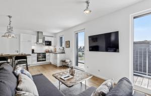 TV a/nebo společenská místnost v ubytování Gebirgsresort Winterberg