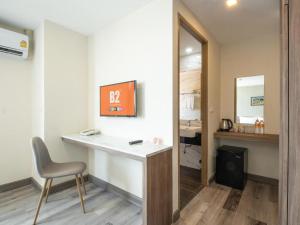 Kuchyň nebo kuchyňský kout v ubytování B2 Korat Premier Hotel