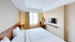 TV a/nebo společenská místnost v ubytování Bianco Costel