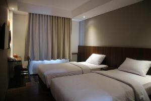 Postel nebo postele na pokoji v ubytování Bianco Costel