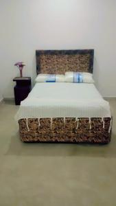 Una cama o camas en una habitación de Dil Mountain