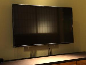 TV a/nebo společenská místnost v ubytování 京一軒町家 さと居 鉄仙 SATOI TESSEN Omiya-Gojo