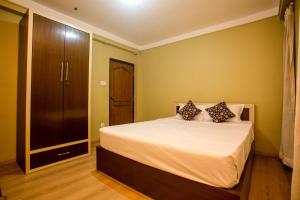 Postel nebo postele na pokoji v ubytování Nag Pukhu Guest House