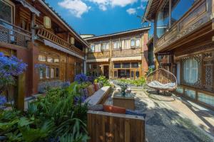 Taman di luar Lijiang Cotton Qiqi Boutique Inn