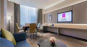 Ruang duduk di Echarm Hotel Xi'an Dayan Tower Datang Lively District