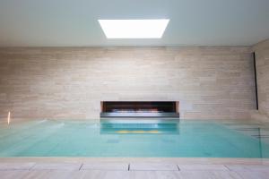 The swimming pool at or close to Spa Resort Fonte Alla Lepre