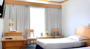 TV a/nebo společenská místnost v ubytování Hotel Marcopolo