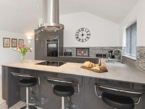 Kuchyň nebo kuchyňský kout v ubytování Bay Cottage