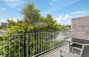 a balcony with a bench and a fence at Gebirgsresort Winterberg in Winterberg