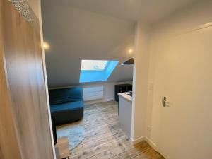 Ένα ή περισσότερα κρεβάτια σε δωμάτιο στο Logement Neuf Cosy avec Espaces Communs Premium 21