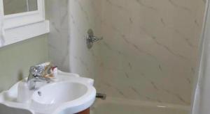 Koupelna v ubytování Post Hotel