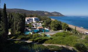 an aerial view of a house and the beach at Villa Pergia Latchi in Polis Chrysochous