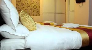 Postel nebo postele na pokoji v ubytování De Hotel Veda