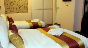 Postel nebo postele na pokoji v ubytování De Hotel Veda