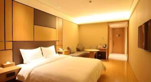 Postel nebo postele na pokoji v ubytování JI Hotel Shanghai Zhangjiang