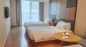 Postel nebo postele na pokoji v ubytování JI Hotel Shanghai Zhangjiang