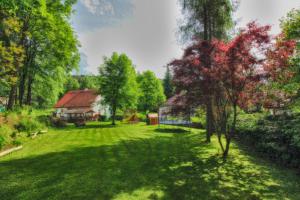 Vonkajšia záhrada v ubytovaní Orange House