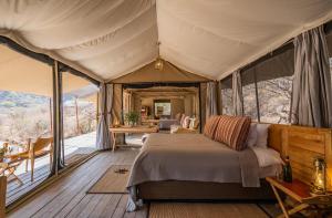 Voodi või voodid majutusasutuse Basecamp Samburu toas