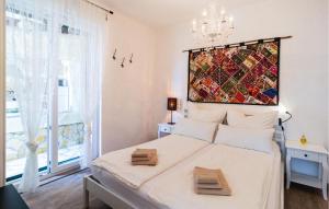 Posteľ alebo postele v izbe v ubytovaní Two-Bedroom Apartment In Ivan Dolac