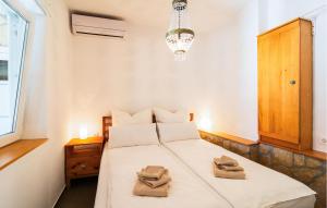 Posteľ alebo postele v izbe v ubytovaní Two-Bedroom Apartment In Ivan Dolac