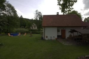 Vonkajšia záhrada v ubytovaní Orange House