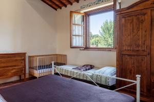 Postel nebo postele na pokoji v ubytování Agriturismo Carpineto + 22 fotografií