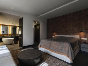 Voodi või voodid majutusasutuse Tufenkian Historic Yerevan Hotel toas