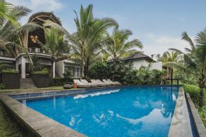 Piscina de la sau aproape de Maar Resort & Spa Ubud by Ini Vie Hospitality