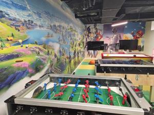 a room with a large painting on the wall at Sea view and Aqua park Apartments at Caesar Blue Complex in Iskele