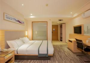 Μια τηλεόραση ή/και κέντρο ψυχαγωγίας στο City Comfort Inn Nanning Guangxi University