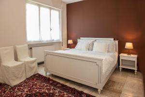 Postel nebo postele na pokoji v ubytování Casa Cristini + 16 fotografií
